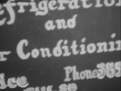 20世纪40年代/ 50年代蒙太奇B/W MS女人在办公室接听电话/ MS男人接听电话/男人用喷灯修理设备/“爱德华制冷和空调服务”的签名/格林伍德，塔尔萨，俄克拉荷马州，美国视频下载