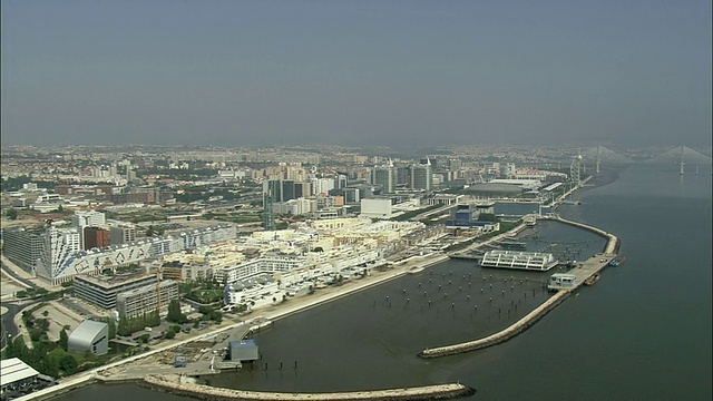 AERIAL WS Cityscape with park das Nacoes /葡萄牙里斯本视频素材