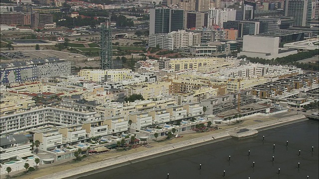 AERIAL WS Cityscape with park das Nacoes /葡萄牙里斯本视频素材