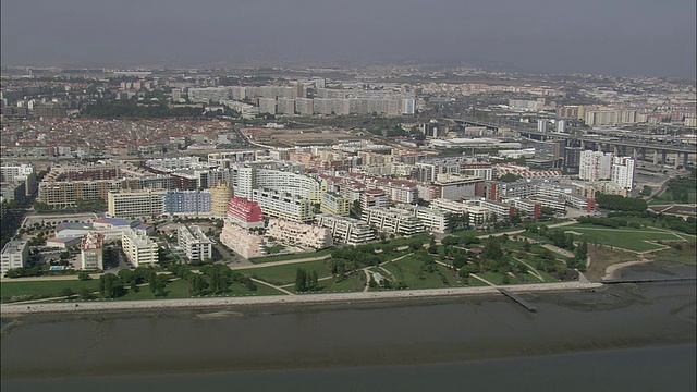 AERIAL WS Cityscape with park das Nacoes /葡萄牙里斯本视频素材