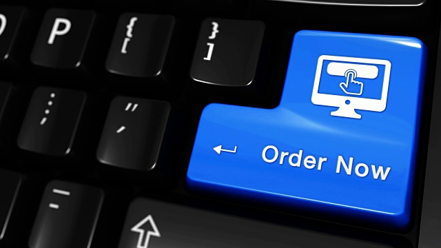 Order Now Moving Motion On Blue Enter Button On Modern Computer Keyboard with Text and icon Labeled.在现代计算机键盘上输入文本和图标。选择焦点键是按下动画。视频素材