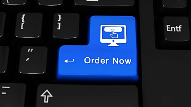 Order Now Moving Motion On Blue Enter Button On Modern Computer Keyboard with Text and icon Labeled.在现代计算机键盘上输入文本和图标。选择焦点键是按下动画。视频素材