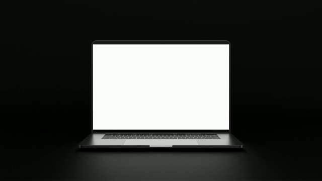 笔记本电脑的空白屏幕隔离在黑暗的背景。视频素材