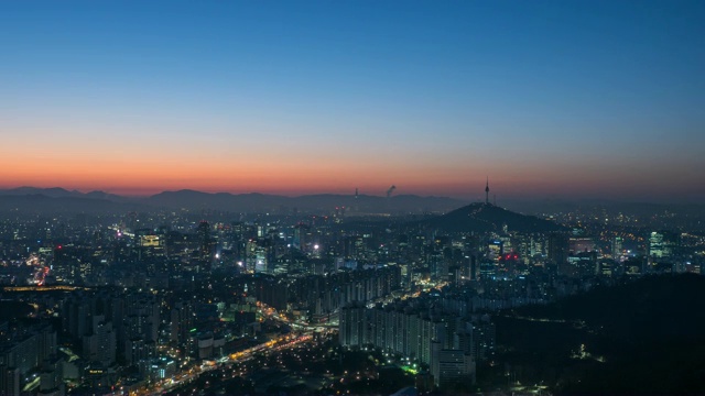 夜景和日出在南山周围的市中心地区，中古，首尔视频素材