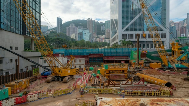 延时拍摄:在香港中环的建筑工地工作视频素材