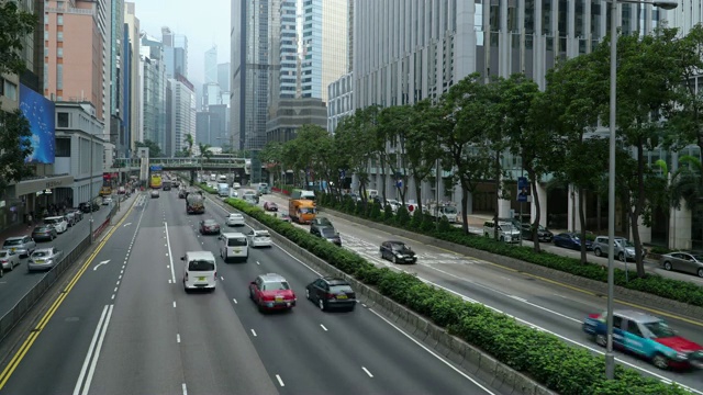 白天的交通延时和香港摩天大楼景观。视频素材