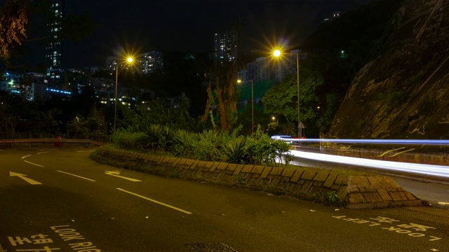 夜间照明香港城市交通街道全景，4k时间间隔视频素材