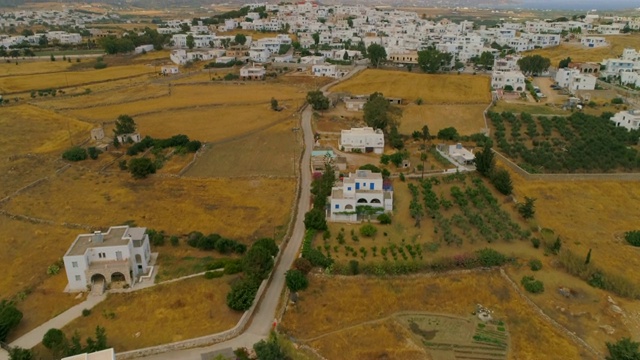 Aerial: Looking down on Backyards and Neighborhood in Paros，希腊视频素材