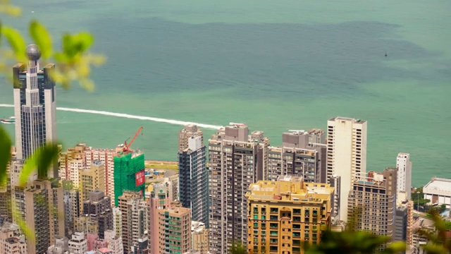 日光香港城市景观著名的维多利亚港交通湾全景4k时间推移视频素材