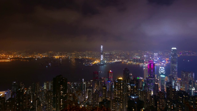 夜晚照亮香港城市景观山顶视角全景4k时间推移视频素材