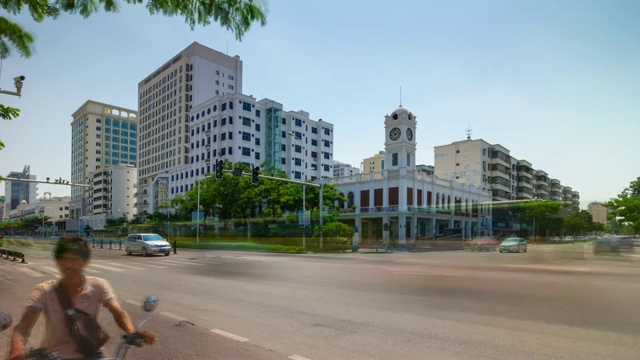 阳光明媚的一天三亚城市交通街道全景4k时间推移海南岛中国视频素材