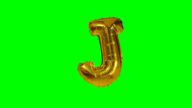 大字母J从字母氦气金色气球漂浮在绿色屏幕上视频下载