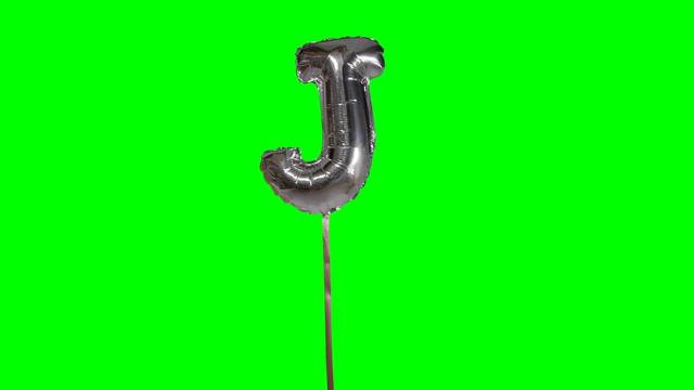 字母J从字母氦气银气球漂浮在绿色屏幕上视频下载