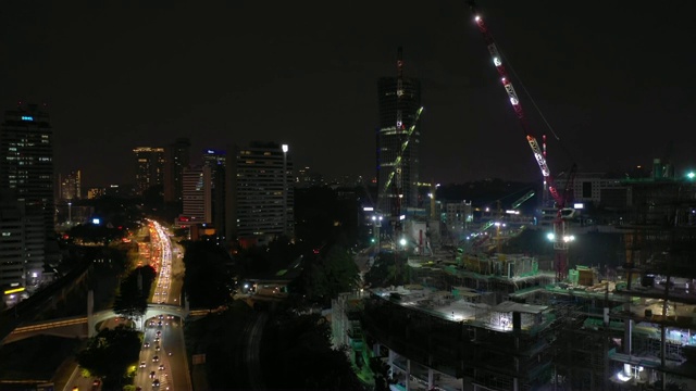 夜间照明吉隆坡城市交通街道道路建设航拍全景4k马来西亚视频素材