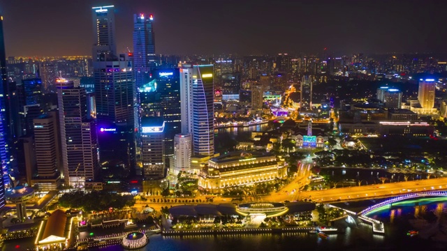 新加坡城市夜间灯光飞行在著名的滨海湾市中心空中全景4k时间推移视频素材