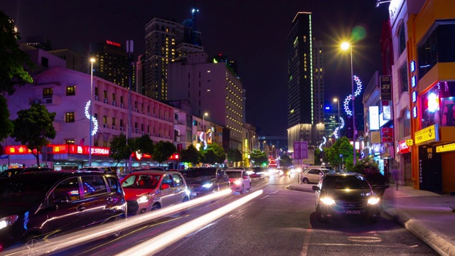 夜晚时间照亮吉隆坡城市交通街道全景，4k时间间隔马来西亚视频素材