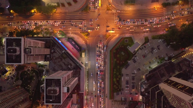 夜光照亮深圳城市交通街道高空俯仰全景4k中国视频素材