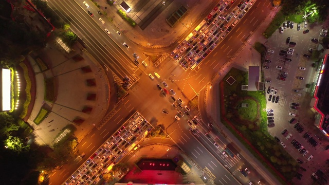 夜景照亮深圳城市交通街道十字路口高空俯仰全景4k中国视频素材