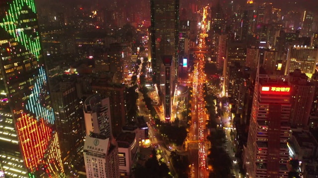 夜景照亮深圳城市交通街道十字路口高空俯仰全景4k中国视频素材