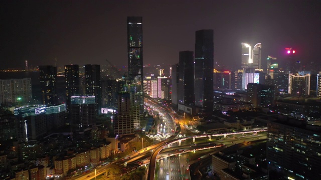 夜间照明飞行在深圳市区交通街道空中全景4k中国视频素材