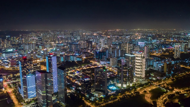 夜间照明新加坡城市景观空中全景，4k时间间隔视频素材