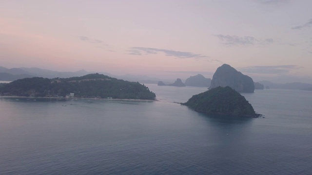 红色天空日落在拉斯卡巴纳斯海滩El Nido Palawan -无人机拍摄视频素材