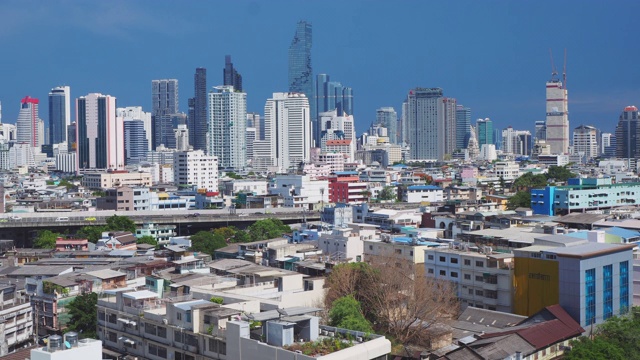 时间流逝拍摄:鸟瞰图的现代建筑在曼谷的城市景观，泰国视频素材