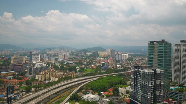 吉隆坡市区晴天交通道路屋顶全景4k马来西亚视频素材