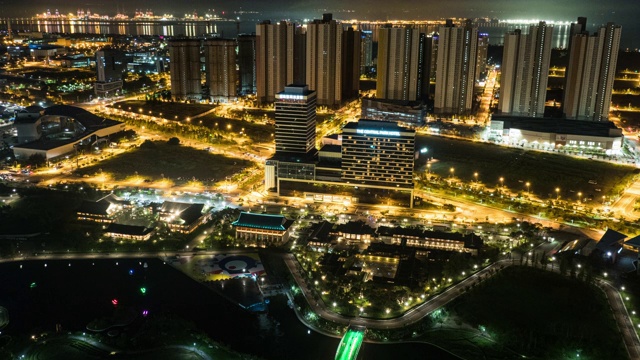 韩国仁川松岛中央公园韩屋酒店的日落夜景及周边建筑视频素材