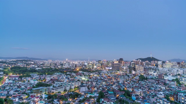 首尔中谷和中野谷市中心的日落和夜景视频素材