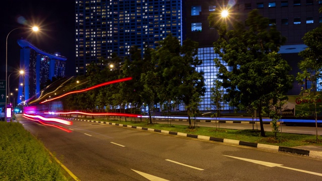 新加坡市中心夜景时间点亮交通街道著名酒店全景4k时间推移视频素材