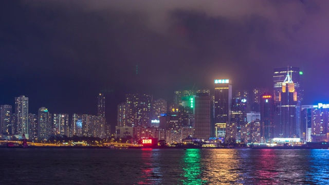 时间流逝:香港天际线市中心夜，维多利亚港视频素材