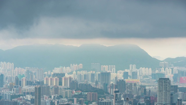 时间推移鸟瞰香港城市在上午与建筑现代城市商务区视频素材