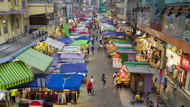 4K超高清时光流逝:中国香港旺角的花园跳蚤市场。从白天到夜晚的延时视频素材