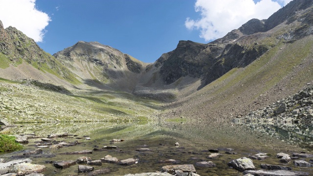 low angle TL: cloudscape view on Alpine Mountain Lakes of Schwarzmoos, Gossenköllesee, Kühtai, Tyrol, Austria视频素材