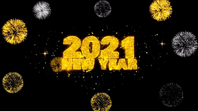 2021年新年祝福语在闪闪发光的金色粒子烟花上揭晓。视频素材