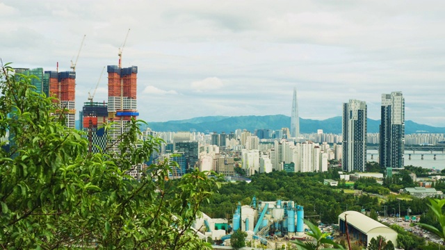 时间流逝拍摄的首尔城市景观与乐天大厦和汉江，韩国视频素材