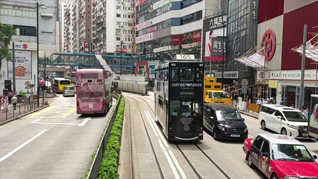 时间流逝，香港商务区的交通情况视频素材