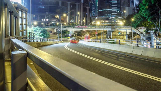 香港一条繁忙街道上汽车的时间流逝视频素材