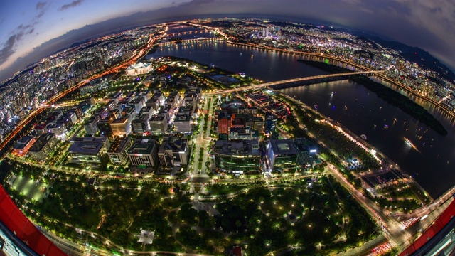 日落到夜晚，韩国首尔，国会大厦和汉江周围的城市景观视频素材