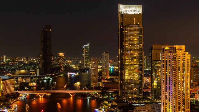 包括湄南河在内的曼谷城市夜景的鸟瞰图，时间间隔4K视频素材