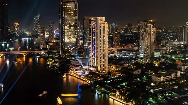 包括湄南河在内的曼谷城市夜景的鸟瞰图，时间间隔4K视频素材