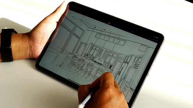 建筑师在数字平板电脑上绘制图纸视频素材