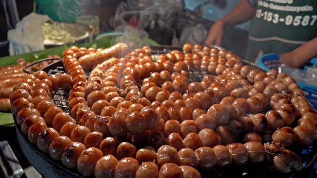 泰国地区的食物背景在晚上的街头食物视频素材