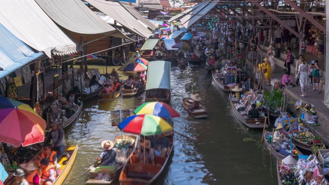 泰国Ratchaburi, Damnoen Saduak，最著名的传统水上市场和文化旅游目的地;缩小-延时视频素材