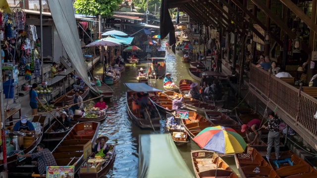 Damnoen Saduak，最著名的传统水上市场和文化旅游目的地，Ratchaburi，泰国，倾斜-时间流逝视频素材