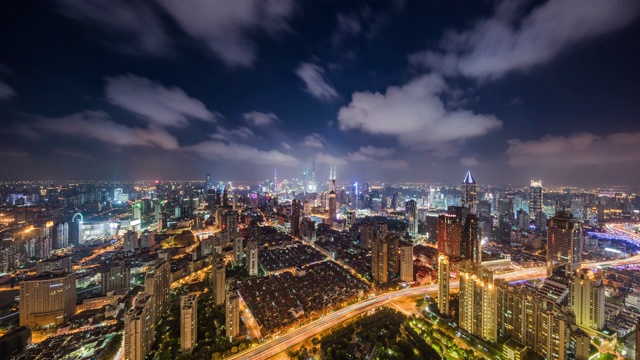 高空俯瞰上海都市夜景过渡全景视频素材