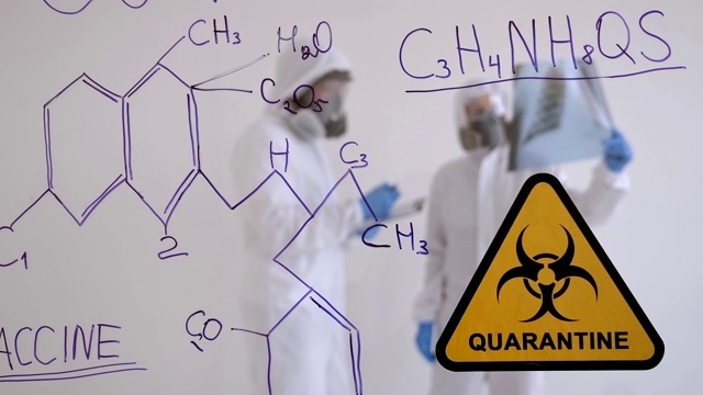 新冠肺炎病毒的化学配方在科学实验室的一块玻璃板上。视频素材