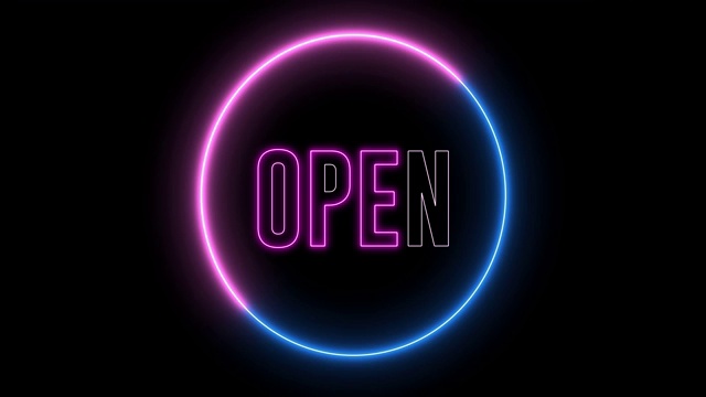 “OPEN”文本与霓虹灯循环动画。抽象的创作对象。视频素材