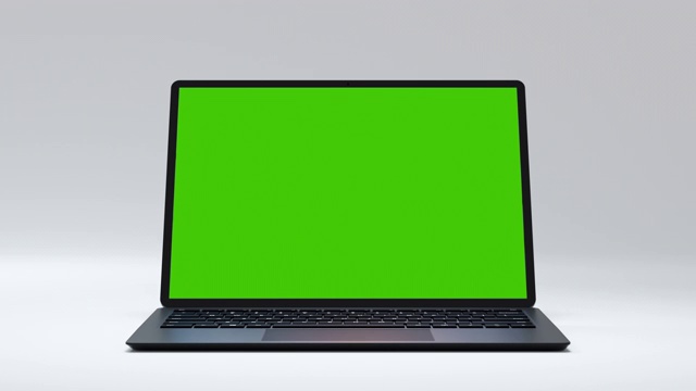 清洁的绿屏电脑，用于商业博客或游戏应用。Motion Laptop with Chroma Key for Advertising Mock Up or News Site。显示绿屏背景笔记本没有人4k视频素材